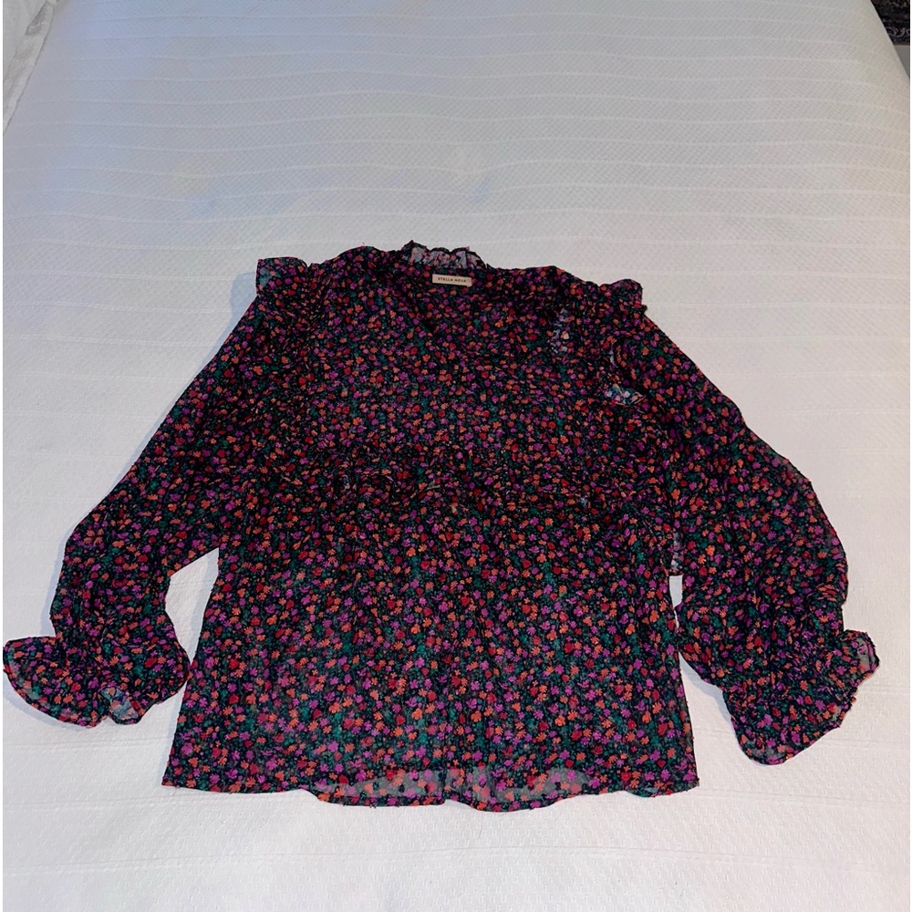 NWOT FLOCK PRINTED FLOUNCE BLOUSE Sice 38 (Aprox 10 US)